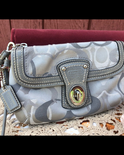 Beautiful Silver Coach wristlet LN