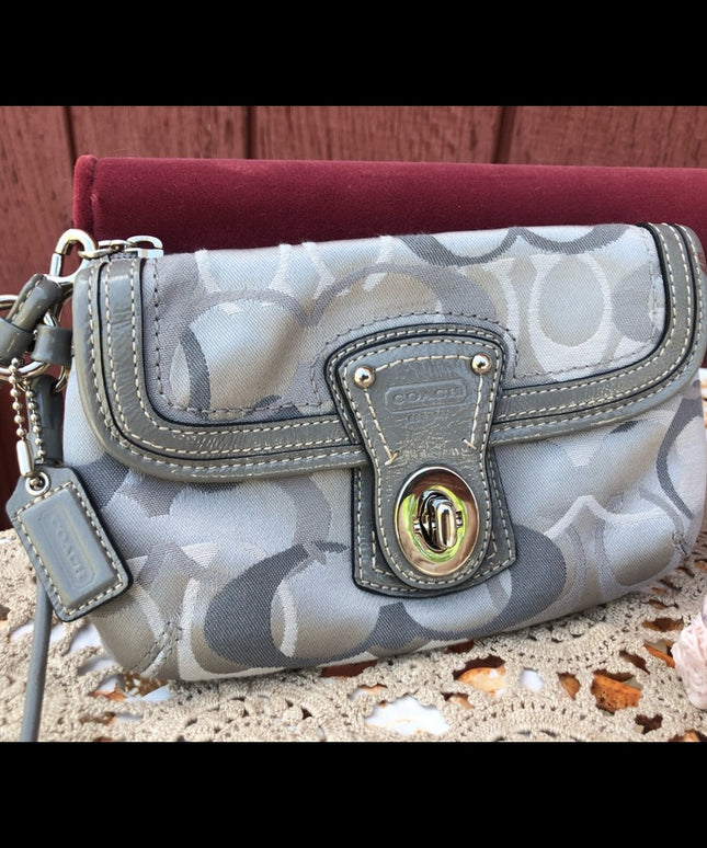 Beautiful Silver Coach wristlet LN
