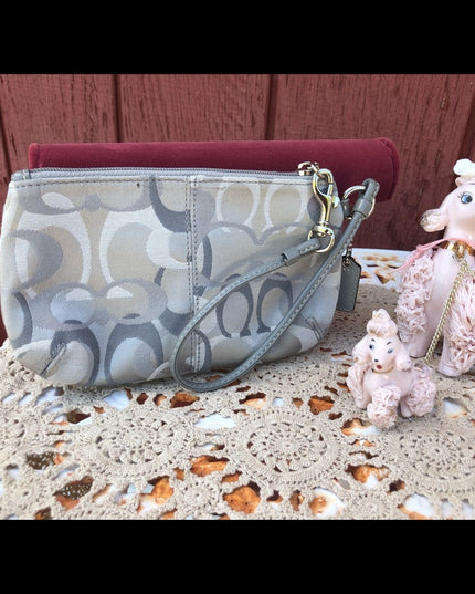 Beautiful Silver Coach wristlet LN