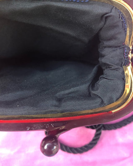 Vintage small black quilted fabric shoulder bag