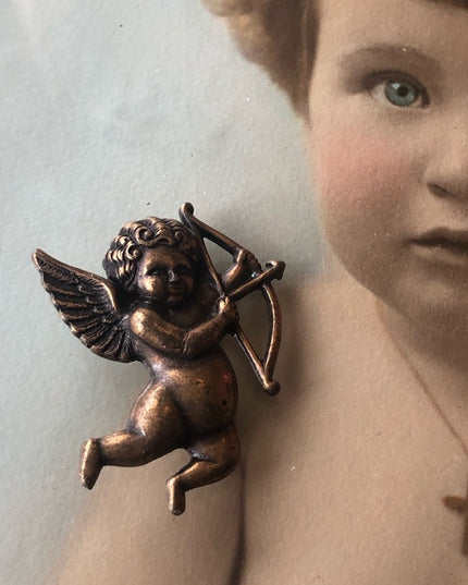 Vintage cupid angel brooch