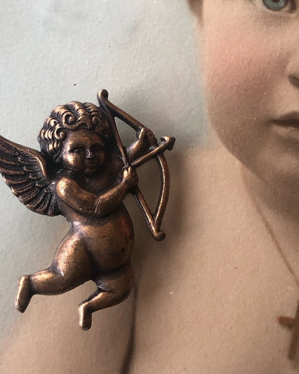 Vintage cupid angel brooch