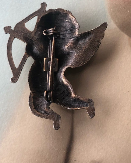 Vintage cupid angel brooch