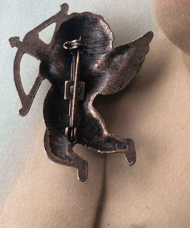 Vintage cupid angel brooch