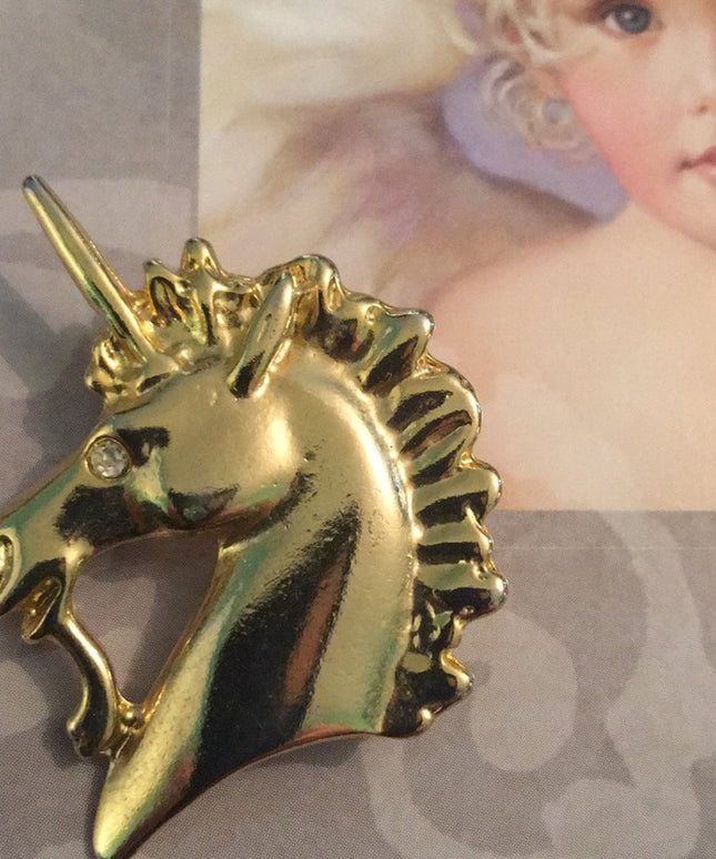 Vintage gold tone Unicorn brooch