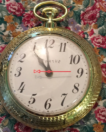 Vintage gold Spartus Bar clock reverse numbers