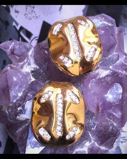 Vintage 1980s Nina Ricci gold rhinestone clip ons