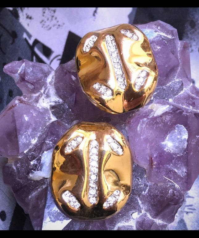 Vintage 1980s Nina Ricci gold rhinestone clip ons