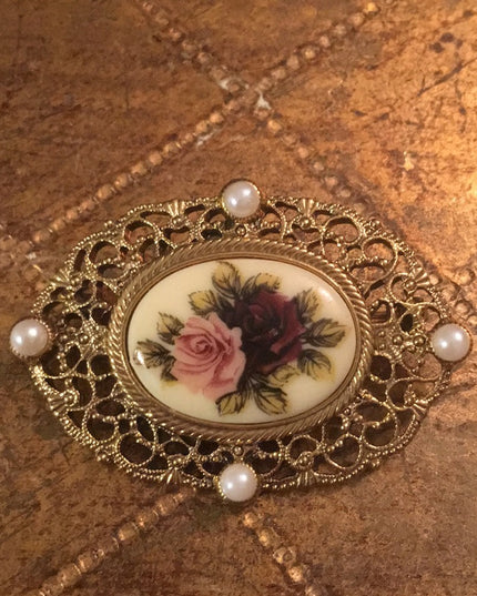 Vintage faux pearl gold tone flower cameo brooch