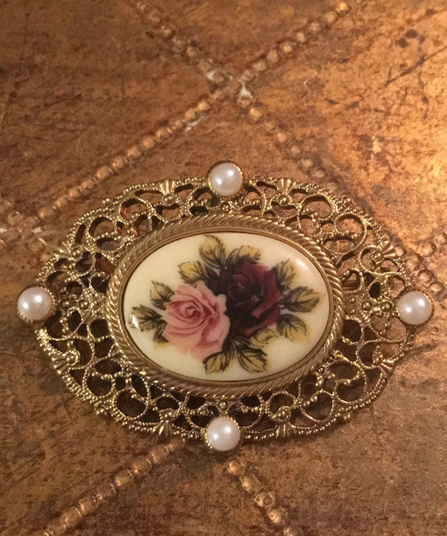 Vintage faux pearl gold tone flower cameo brooch