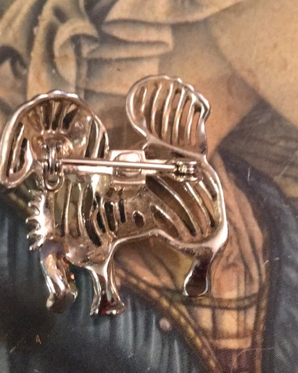 Vintage gold tone dog brooch
