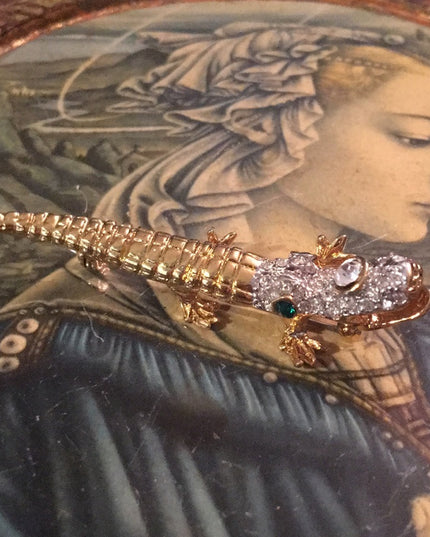 Vintage crystal gold tone aligator brooch