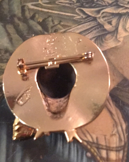 Gold tone hat crystal brooch