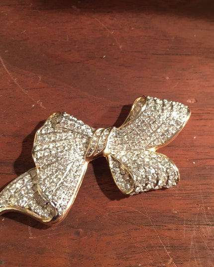 VTG gold tone rhinestone bow brooch