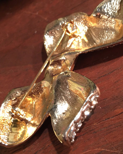 VTG gold tone rhinestone bow brooch