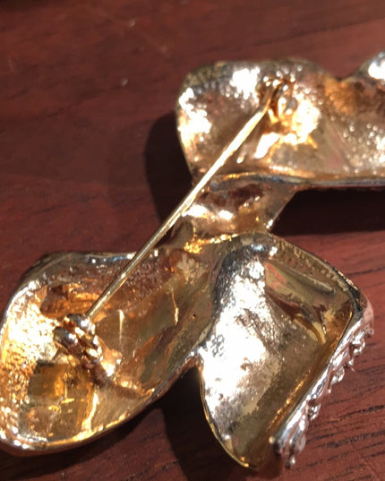 VTG gold tone rhinestone bow brooch