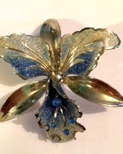 Vintage 1960s silver Orchid rhinestone brooch