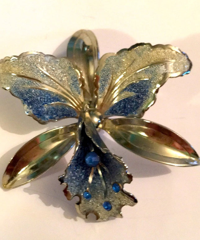 Vintage 1960s silver Orchid rhinestone brooch