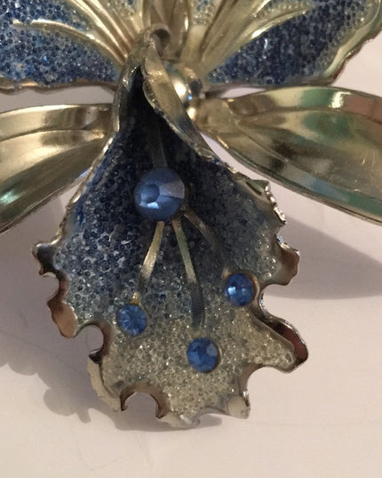 Vintage 1960s silver Orchid rhinestone brooch