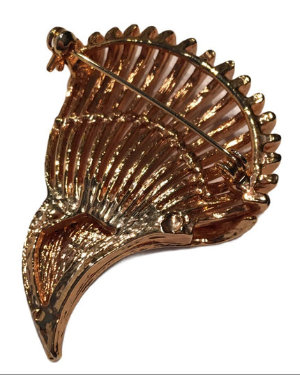 Vintage gold rhinestone brooch flare