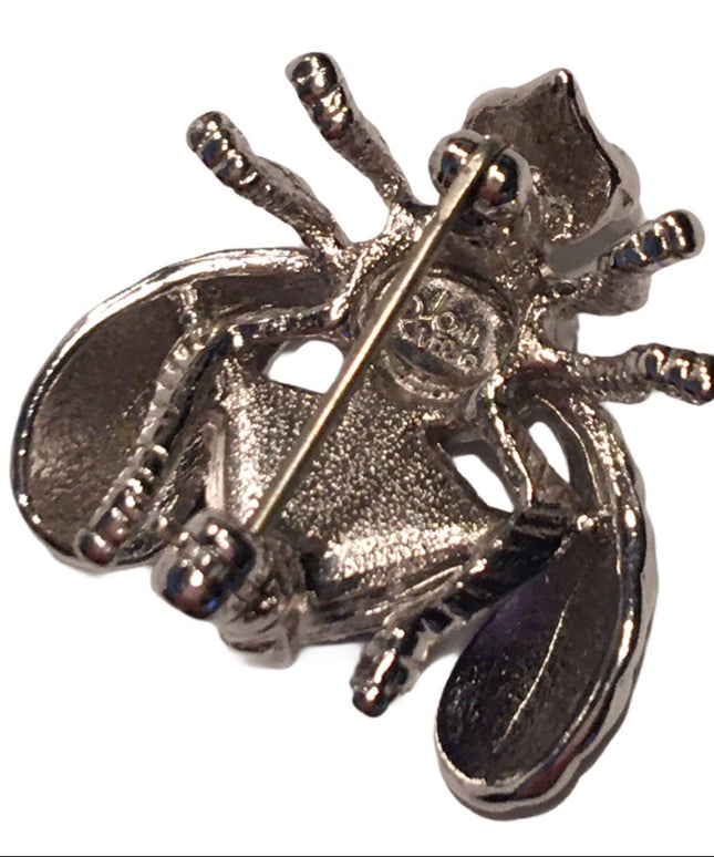 Joan Rivers bug brooch purple crystal
