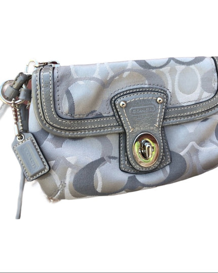 Beautiful Silver Coach wristlet LN