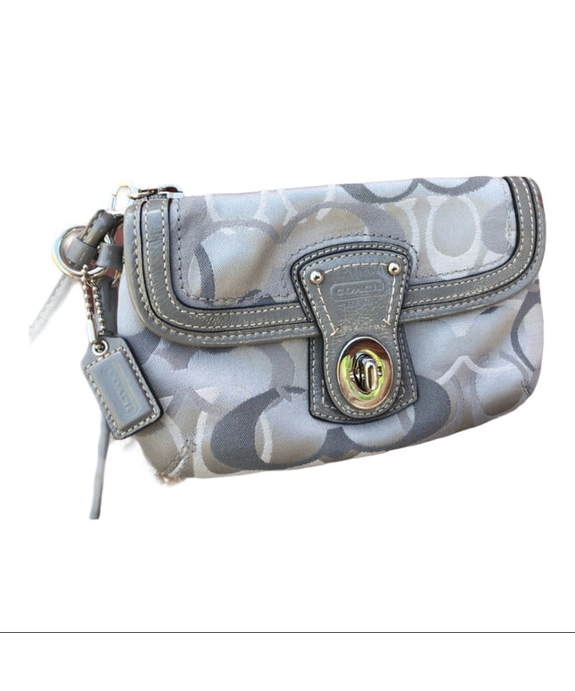 Beautiful Silver Coach wristlet LN