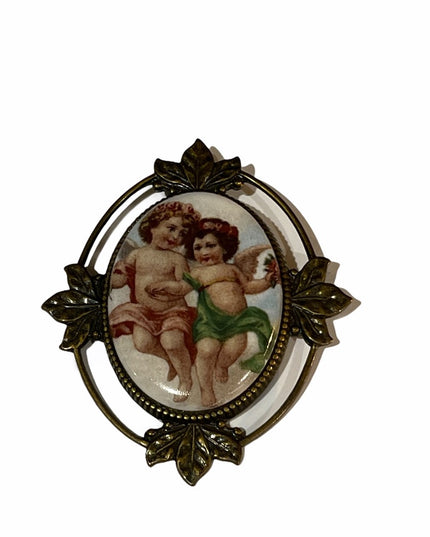 Angel Cherub pendant brooch antiqued