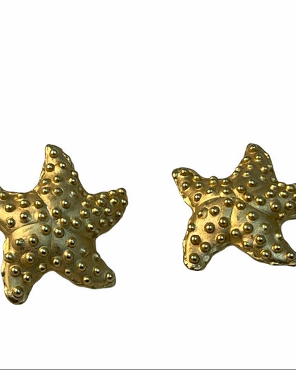 DKNY Designer starfish clip on gold earrings