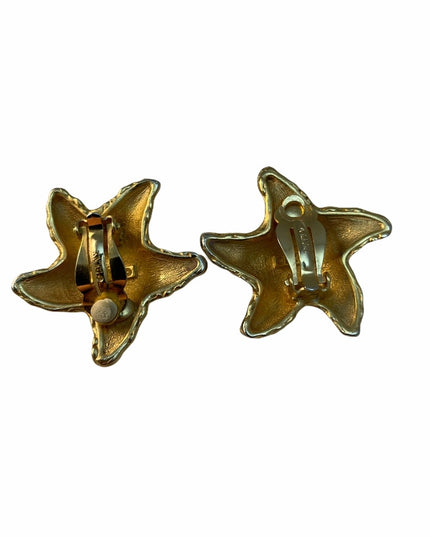 DKNY Designer starfish clip on gold earrings