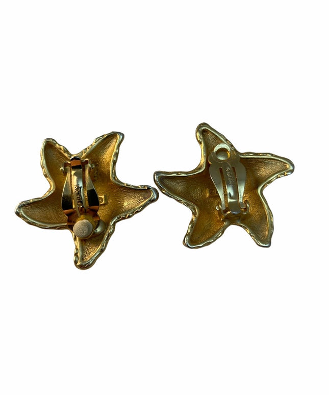 DKNY Designer starfish clip on gold earrings