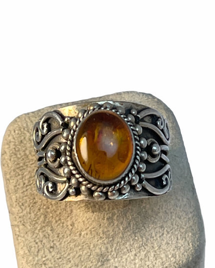Sterling silver fancy cigar band amber ring