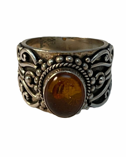 Sterling silver fancy cigar band amber ring