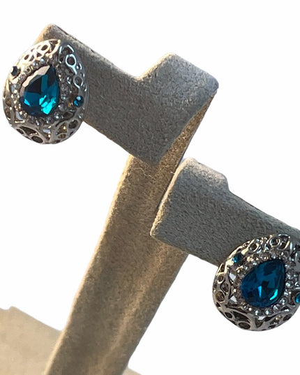 Fancy silver tone and blue glass crystal huggie