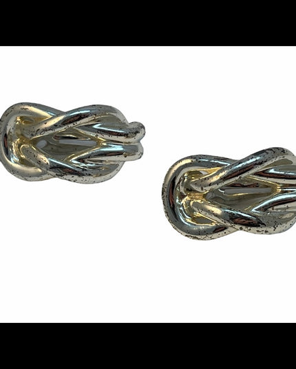 Nina Ricci  Distressed silver sailors knot earring