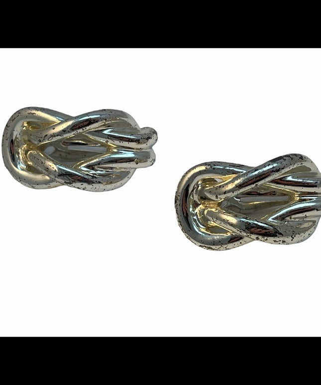 Nina Ricci  Distressed silver sailors knot earring