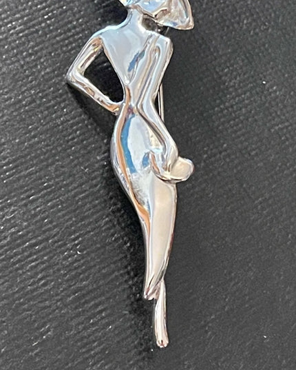 Vintage silver tone metal classy lady in a dress brooch