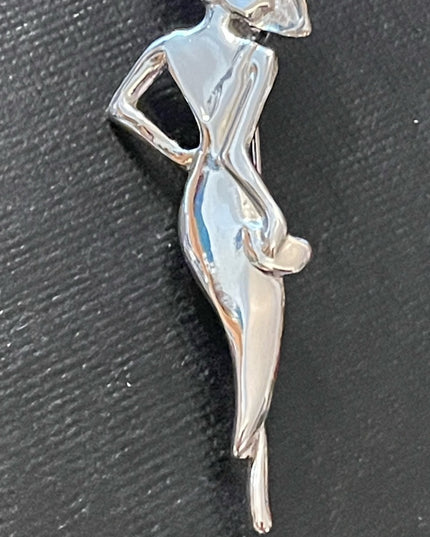 Vintage silver tone metal classy lady in a dress brooch
