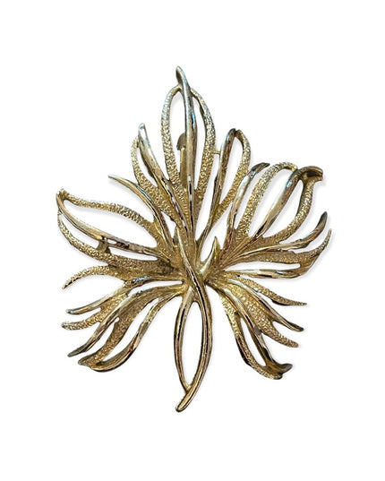Vintage gold tone metal fancy brooch