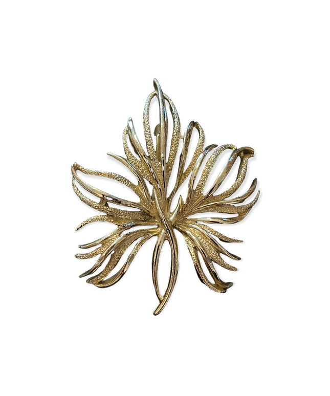 Vintage gold tone metal fancy brooch