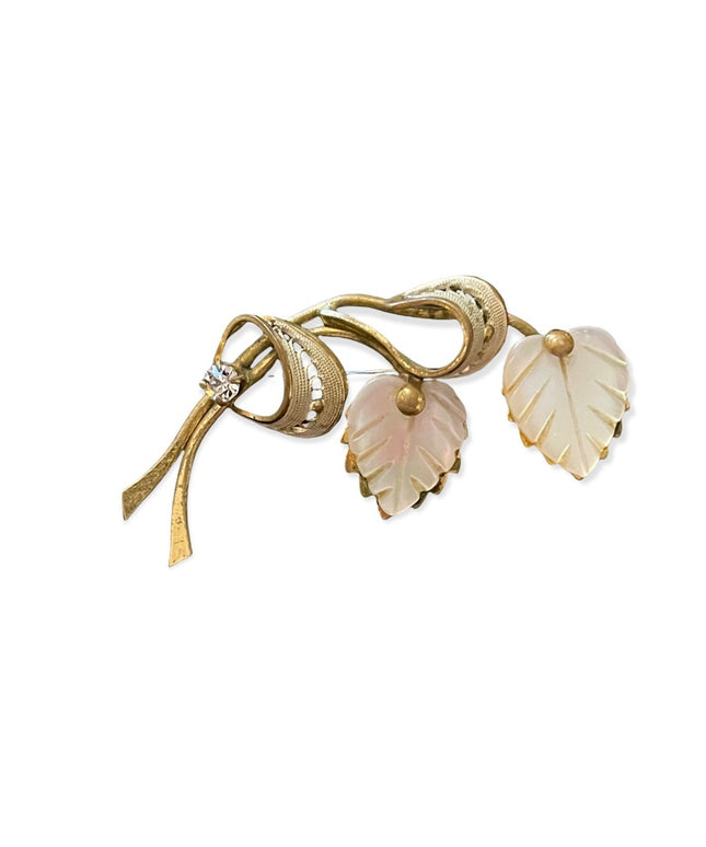 Vintage gold tone filagree leaf rhinestone Continental brooch