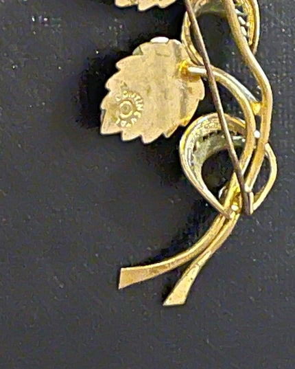 Vintage gold tone filagree leaf rhinestone Continental brooch