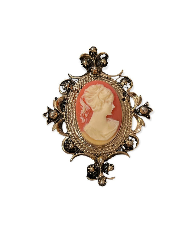 Antiqued 1980s vintage faux cameo gold tone brooch