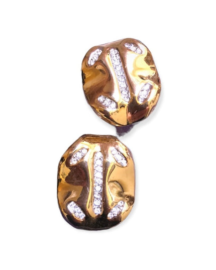Vintage 1980s Nina Ricci gold rhinestone clip ons