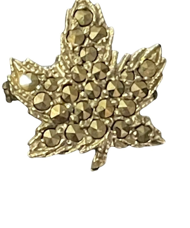 Vintage small silver tone marcasite maple leap pin brooch