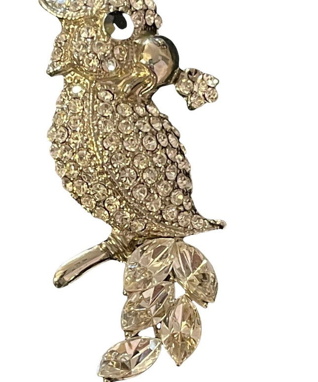 Vintage fancy silver finish clear crystal pareot brooch