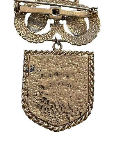 Vintage gold finish coat of arms lion seal crest brooch