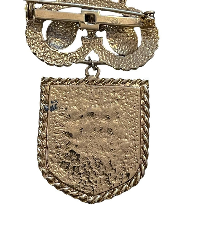 Vintage gold finish coat of arms lion seal crest brooch