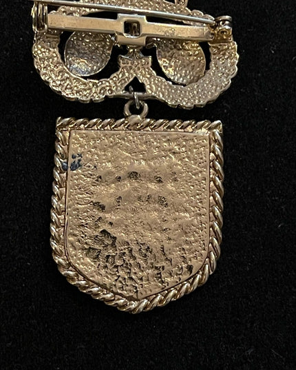 Vintage gold finish coat of arms lion seal crest brooch