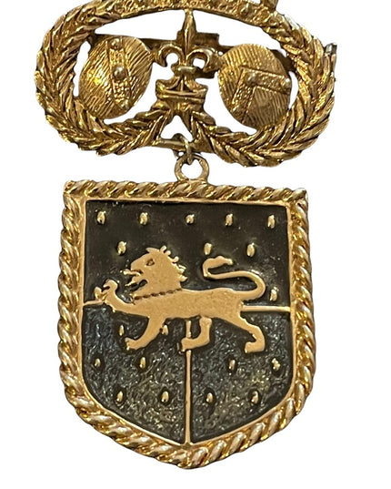 Vintage gold finish coat of arms lion seal crest brooch